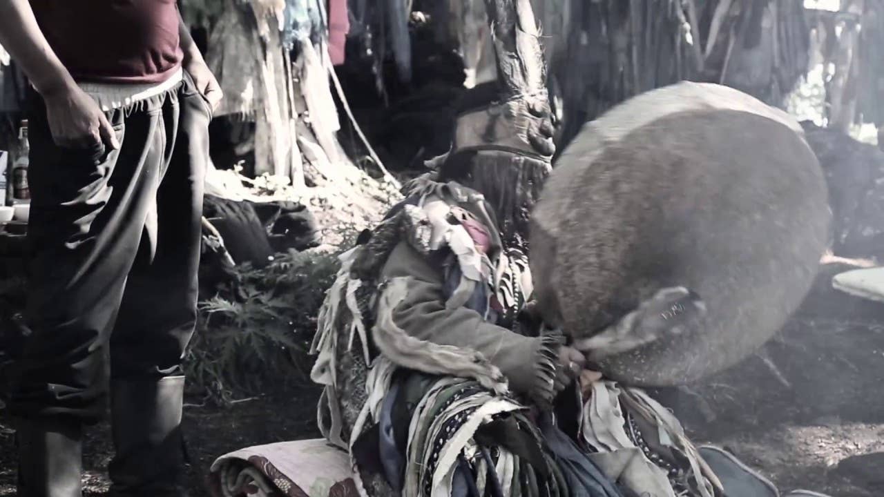 A Darkhad shaman performing a ritual in Inner Mongolia's Darkhad Valley. (Screen capture from <a href="https://www.youtube.com/watch?v=aaQU5N3vsFU" target="_blank" rel="noreferrer noopener">YouTube</a>)