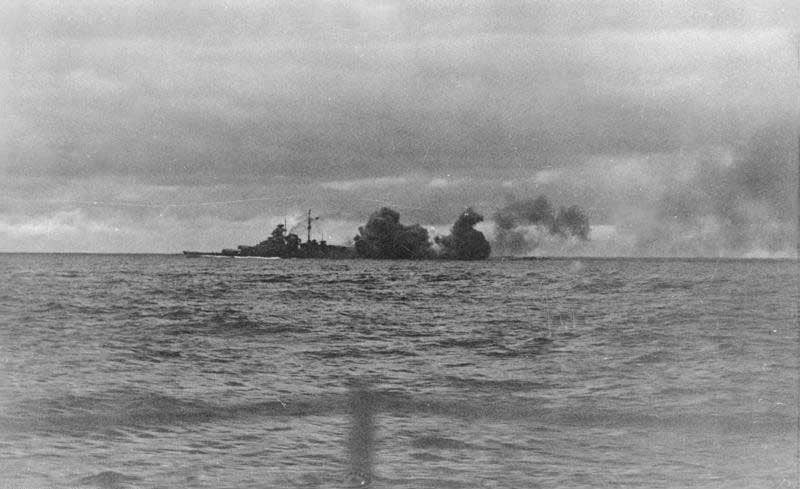 The Bismarck fires during the Battle of the Denmark Straits in May, 1941. It sank the pride of the Royal Navy, the HMS <em>Hood</em>, during the engagement. (German federal archives)