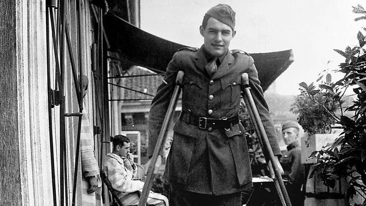 Hemingway on crutches in World War I.