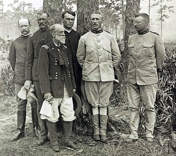 Wheeler, front, stands with some of his subordinate cavalry officers including then-Col. Theodore Roosevelt at his left. (U.S. National Archives)