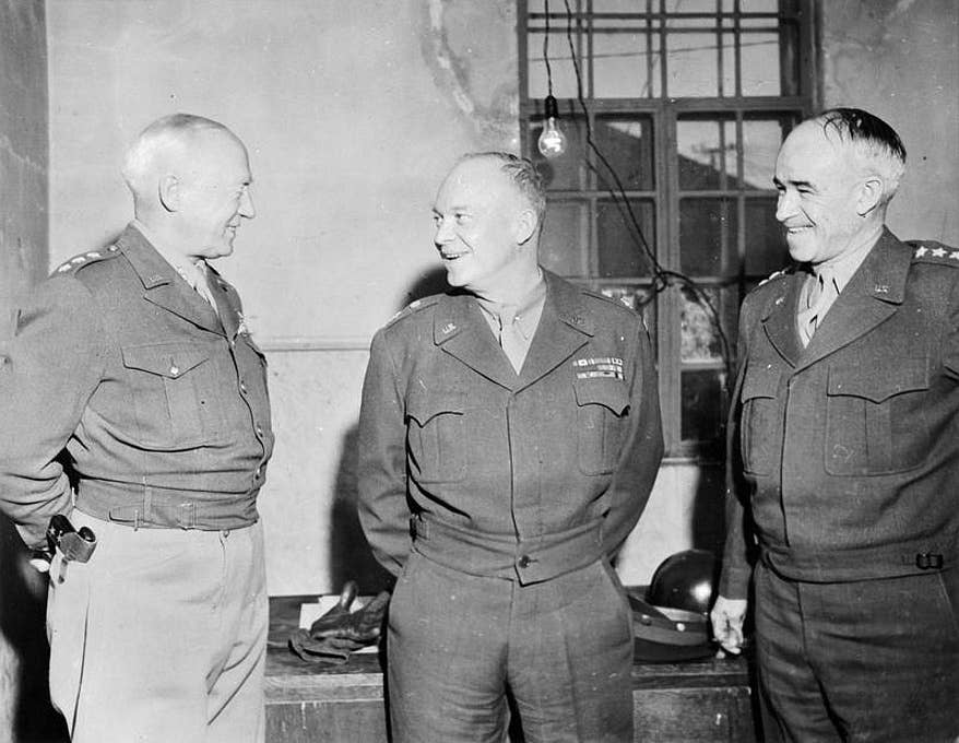 Lieutenant Generals George S. Patton and Omar Bradley talk with Gen. Dwight D. Eisenhower in Bastogne, Belgium, in 1944. There are a surprising number of photos of these three together. (U.S. Army)