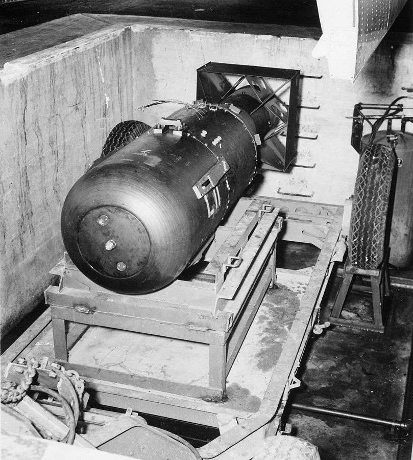 The Little Boy bomb is prepped on Tinian island for insertion into the Enola Gay's bomb bay.<br>(U.S. National Archives and Records Administration)