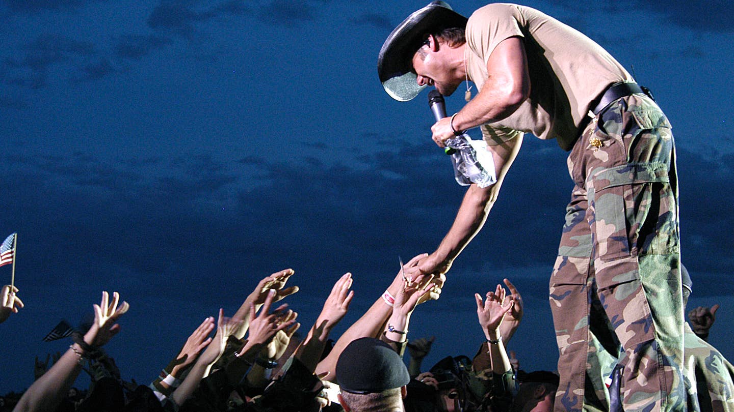 8 country music tearjerkers about troops