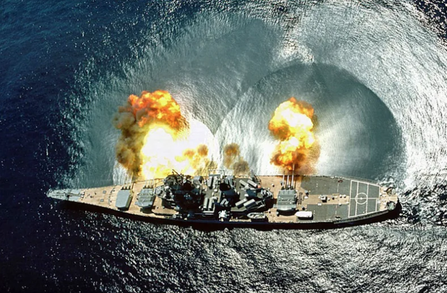 Back when Battleships weren't museums. USS <em>Iowa</em> (BB-61) fires a full broadside of her nine 16″/50 and six 5″/38 guns during a target exercise near Vieques Island, Puerto Rico (<img srcset="//upload.wikimedia.org/wikipedia/commons/thumb/5/55/WMA_button2b.png/17px-WMA_button2b.png 1x, //upload.wikimedia.org/wikipedia/commons/thumb/5/55/WMA_button2b.png/34px-WMA_button2b.png 2x" src="https://upload.wikimedia.org/wikipedia/commons/thumb/5/55/WMA_button2b.png/17px-WMA_button2b.png" alt="">21°N 65°W). Note concussion effects on the water surface, and 16-inch gun barrels in varying degrees of recoil. (National Archives)