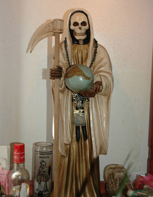 A statue of Santa Muerte in a practitioner's home.