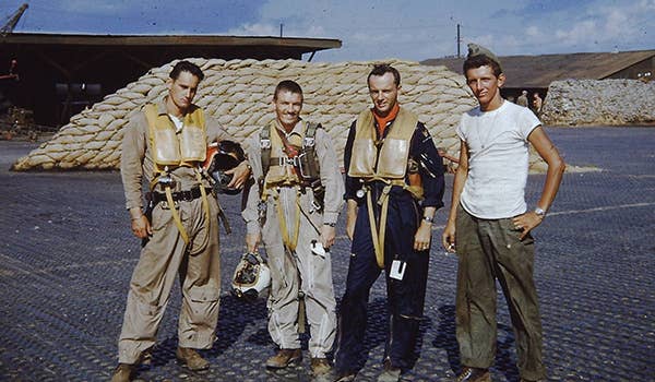 Maj. Charles J. Loring Jr. (second from left) poses with other members of the 80th Fighter-Bomber Squadron at Suwon Air Base, Republic of Korea, in 1952. (U.S. Air Force)