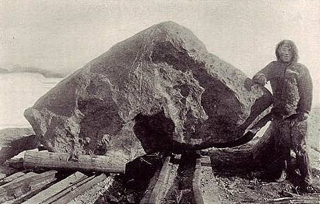Explorer Robert E. Peary with a chunk of the <em>Saviksoah </em>meteor. (Wikimedia Commons)