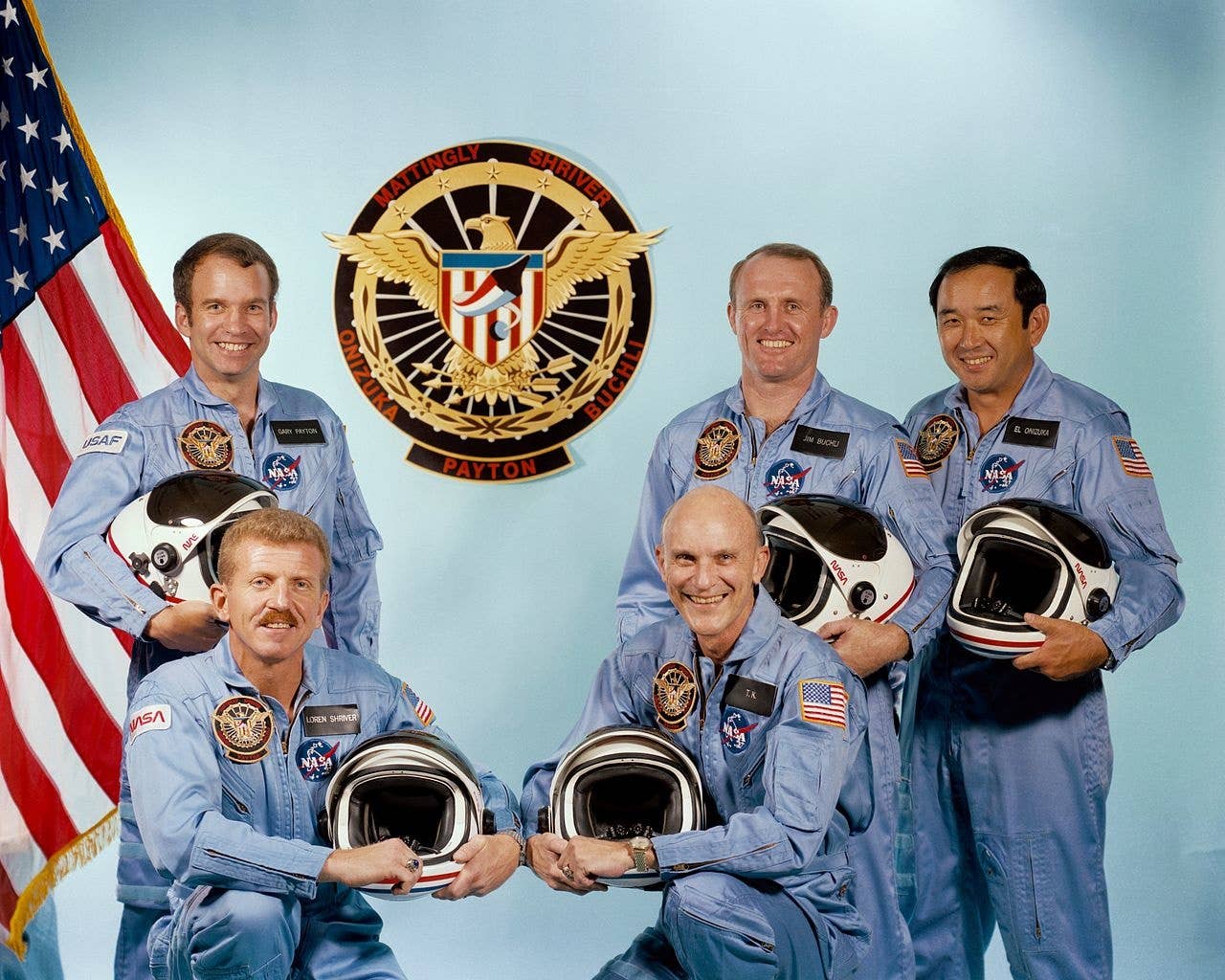 Air Force Spaceflight Engineer Maj. Gary Payton (back left) along with NASA crew members Loren Shriver (front left) and Ken Mattingly (front right), with Jim Buchli and Ellison Onizuka (behind). (NASA)