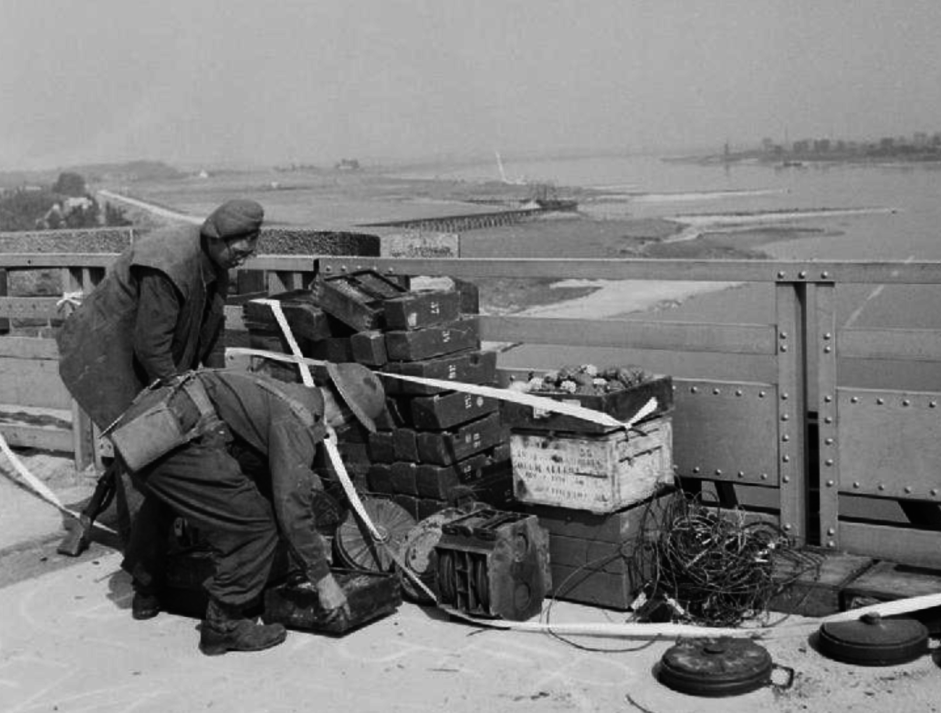 British Engineers remove explosives set by German engineers on a bridge near Arnhem.