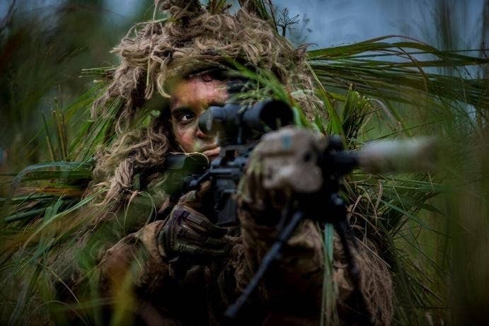 <em>A U.S. Army sniper wears the Flame Resistant Ghillie System. (U.S. Army photo/Released)</em>