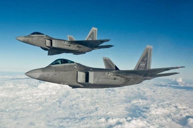 <em>The F-22 Raptor air superiority fighter (Photo by Lockheed Martin)</em>