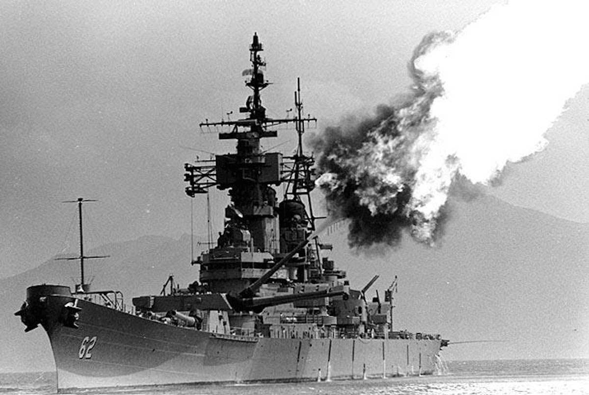 <em>USS New Jersey bombards communist positions near Tuyho, late March 1969 (US Navy photo)</em>