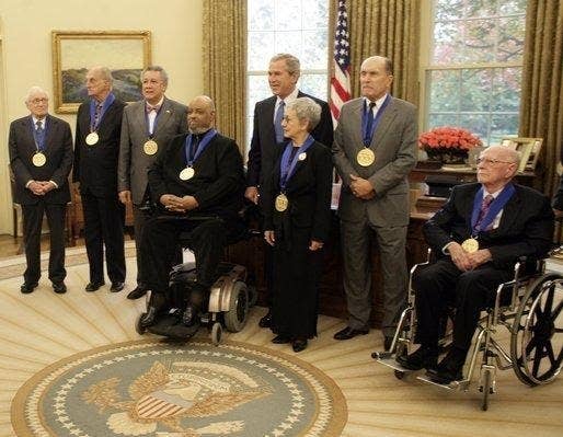 President George W. Bush stands with recipients of the 2005 National Medal of Arts, from left: Leonard Garment, Louis Auchincloss, Paquito D'Rivera, James DePreist, Tina Ramirez, Robert Duvall, and Ollie Johnston. Credit: White House photo by Eric Draper - whitehouse.gov