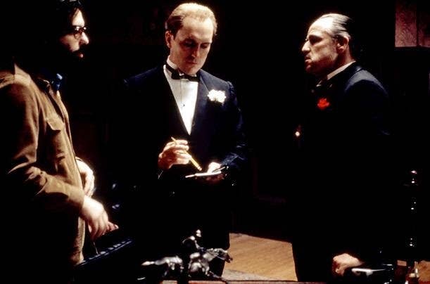 Francis Ford Coppola, Robert, and Marlon Brando on set for "The Godfather." <br>(Paramount)
