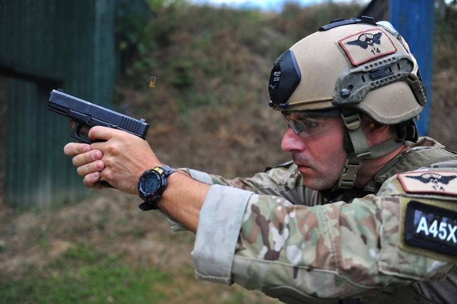 <em>An Air Force Special Operator fires a Glock 19 (U.S. Air Force)</em>