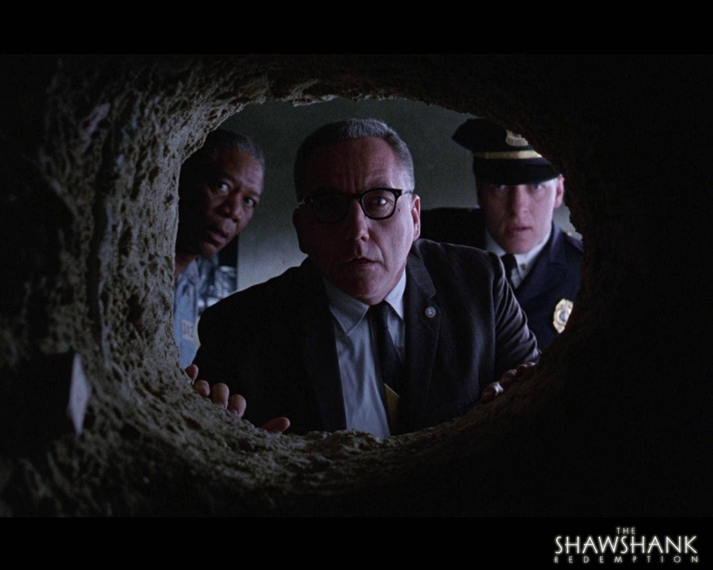 Bob Gunton in a Shawshank Redemption poster with Morgan Freeman and Clancy Brown