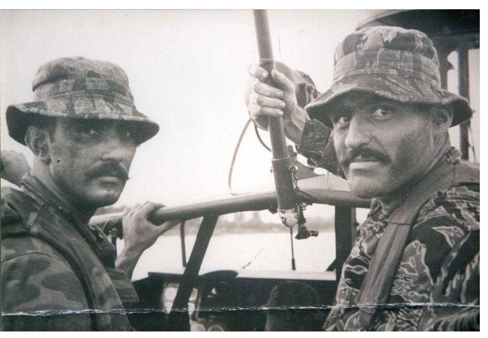 Dick Marcinko (left) and Harry Humphries (right) in Vietnam, 1968. Photo credit unknown.