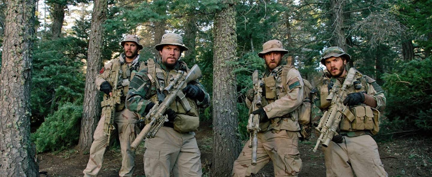Taylor Kitsch, Mark Wahlberg, Ben Foster and Emile Hirsch in <em>Lone Survivor</em>. Photo credit IMDB.com