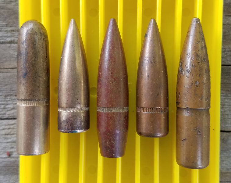 <em>Left to right: M1903, M1906, M1 Ball, M2 Ball, and M2AP .30 caliber bullets (Public Domain)</em>
