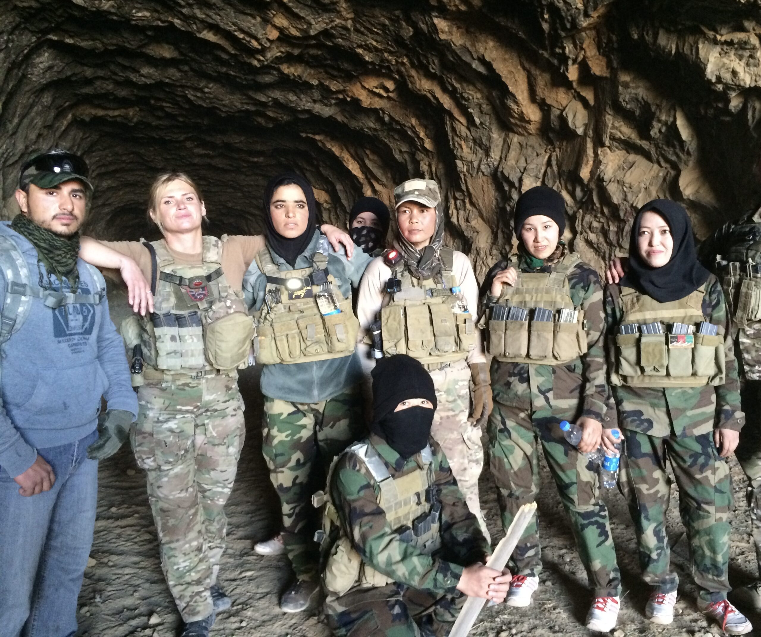 Rebekah Edmonson with Afghan women in military uniforms.