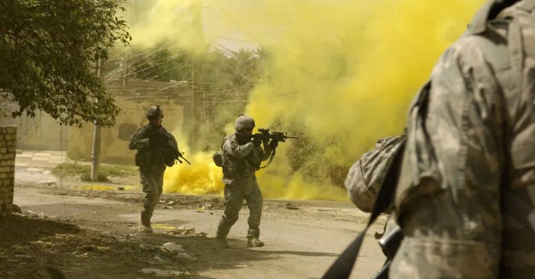 Soldiers from the 5th Battalion, 3rd Brigade, 2nd Infantry Division, 1st Stryker Brigade Combat Team fighting insurgents in Baqubah on March 14,2007.