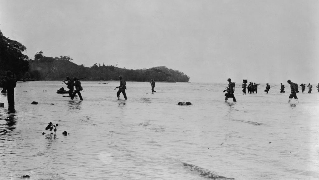 soldiers in shallow water during WWII