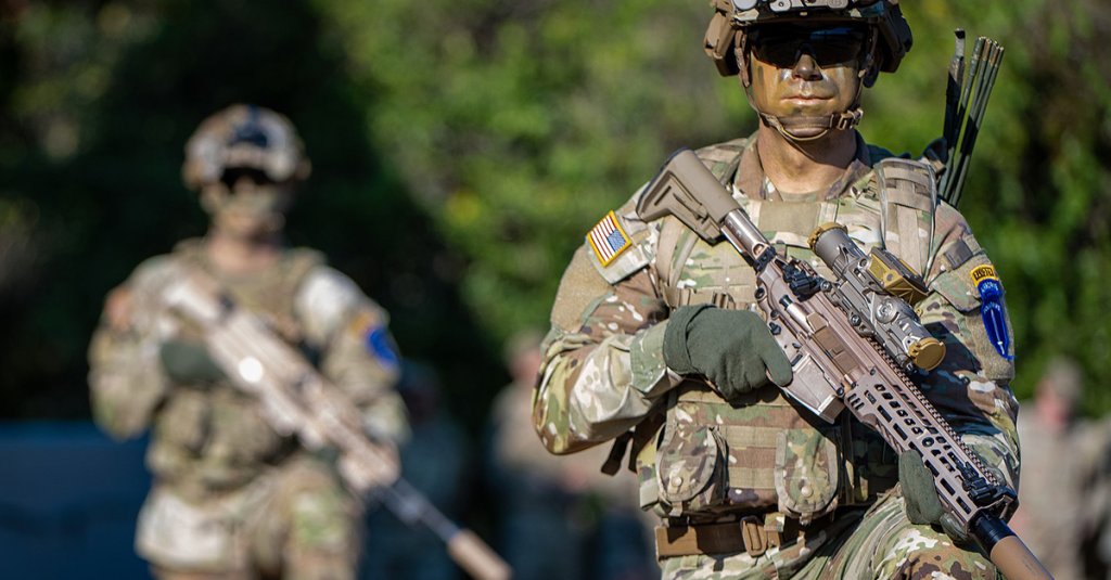 FORT BENNING, Ga. – Soldiers of the 4th Ranger Training Battalion, Airborne and Ranger Training Brigade, demonstrate the U.S. Army’s newest weapon during a Rangers in Action Ceremony September 16, 2022, at Victory Pond, Fort Benning, Georgia. The XM5 Rifle will replace the M4/M4A1 carbine within the close combat force. The new ammunition includes multiple types of tactical and training rounds that increase accuracy and are more lethal against emerging threats than both the 5.56mm and 7.62mm ammunition. (U.S. Army photo by Patrick A. Albright, Maneuver Center of Excellence and Fort Benning Public Affairs)
