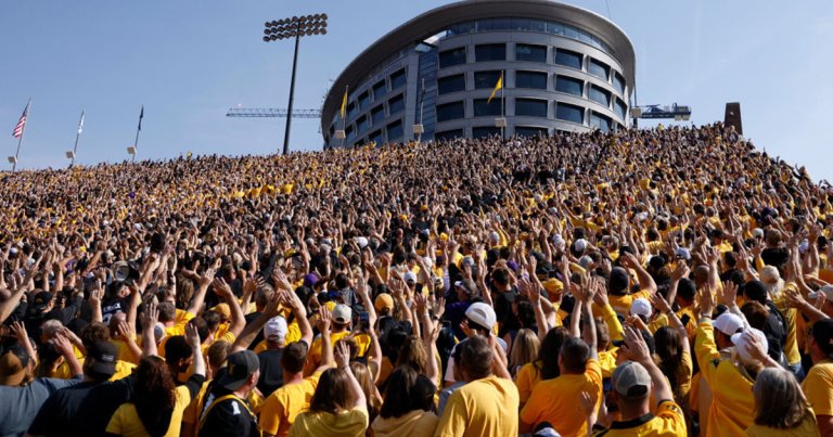 college football traditions kinnick wave iowa