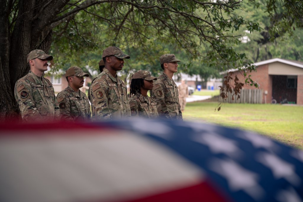 U.S. Air Force honor guardsmen assigned to the 628th Air Base Wing stand ready to receive a coffin during military honors simulation for an active-duty funeral, Joint Base Charleston, South Carolina, June 5, 2025. The 628th Base Honor Guard is tasked with honoring past and present service members by providing military funeral honors to veterans, retirees and fallen active-duty members across South Carolina. (U.S. Air Force photo by Staff Sgt. Zachary Willis)