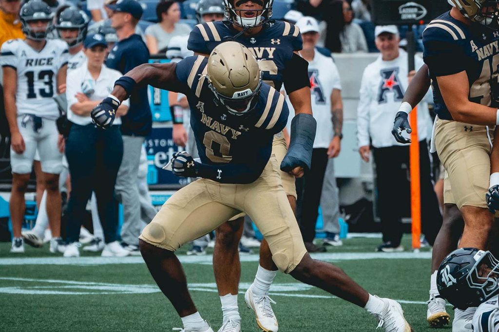 Academy football Navy Beats Rice