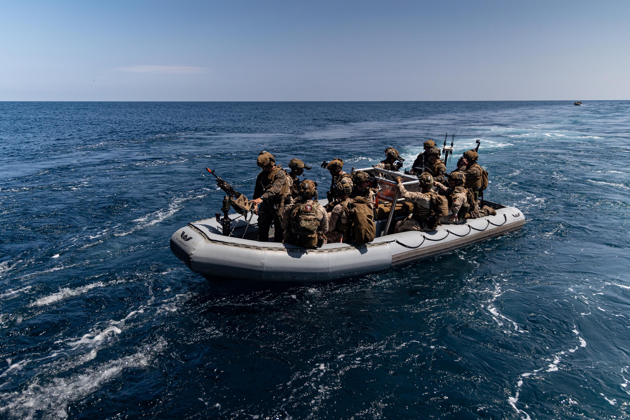U.S. Marines with Maritime Special Purpose Force, 22nd Marine Expeditionary Unit (Special Operations Capable), depart for maritime interdiction operations from the U.S. Navy Wasp-class amphibious assault ship USS Iwo Jima (LHD 7), in support of Composite Training Unit Exercise while underway in the Atlantic Ocean, June 26, 2025. During COMPTUEX, the IWO ARG and 22nd MEU(SOC), refine tactics, techniques, and procedures to execute warfighting functions that enhance operational readiness and lethality as a uni
