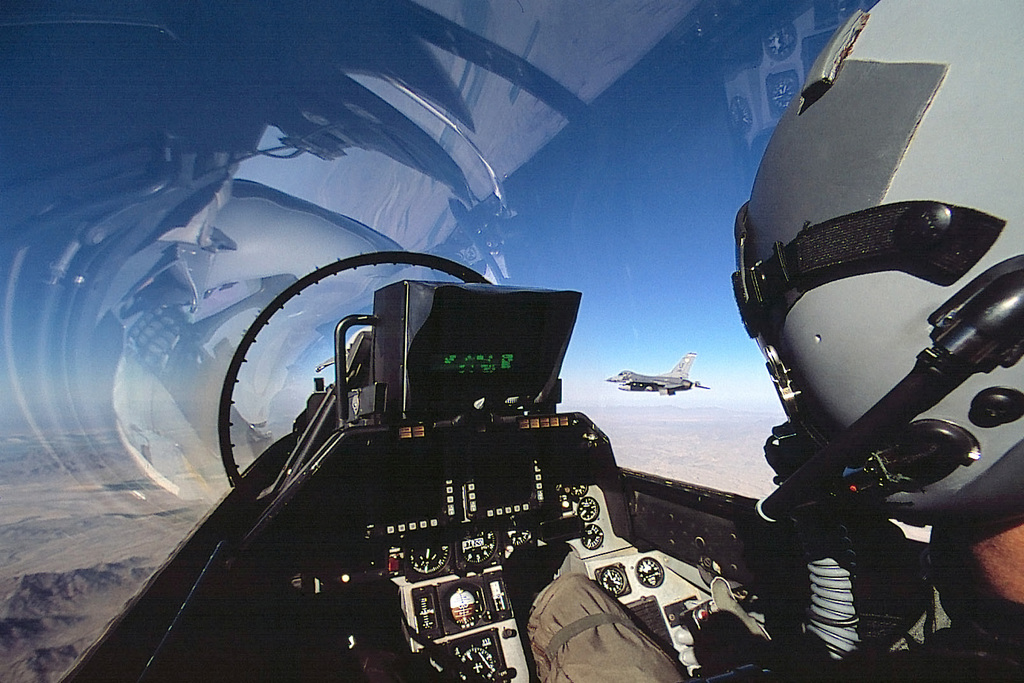 A view from inside the cockpit of an F-16D Fighting Falcon, as it flies in formation with an F-16C from the 308th Fighter Squadron, Luke AFB, Arizona, during a local training mission.