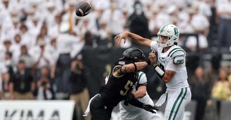 Oct 11, 2025; West Point, New York, USA; Charlotte 49ers quarterback Grayson Loftis (12) throws a pass against the Army Black Knights during the second half at Michie Stadium.
