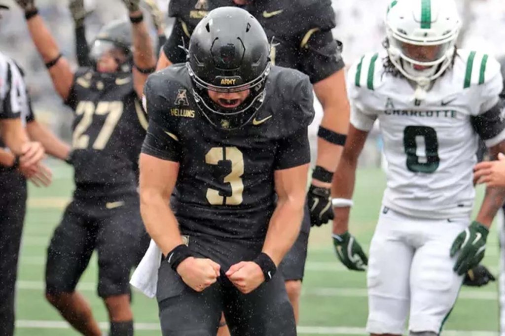 Oct 11, 2025; West Point, New York, USA; Army Black Knights quarterback Cale Hellums (3) celebrates his touchdown against the Charlotte 49ers during the second half at Michie Stadium.