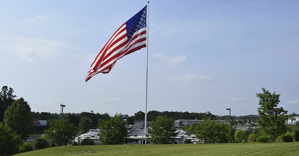 base housing neighbors giant American flag