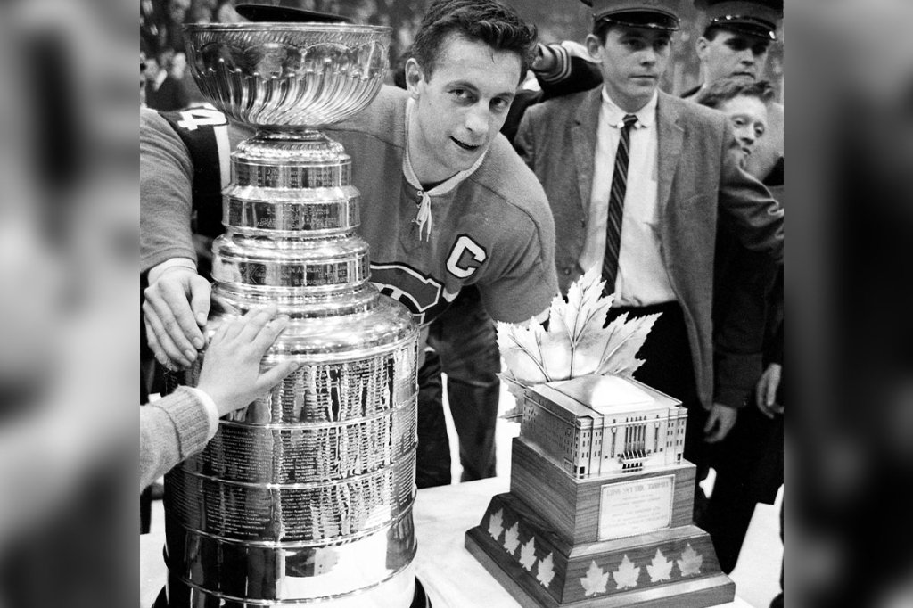 Montreal Canadiens vs Chicago Black Hawks, 1965 NFL Stanley Cup Finals Hockey: NHL Finals: Montreal Canadiens Jean Beliveau (4) victorious with Stanley Cup (L) and Conn Smythe Trophy (R) after winning finals vs Chicago Black Hawks at Montreal Forum. Beliveau wins the inaugural Conn Smythe Trophy, awarded to the MVP of the playoffs. Montreal, Canada 5/1/1965 CREDIT: Joseph Consentino (Photo by Joseph Consentino /Sports Illustrated via Getty Images)