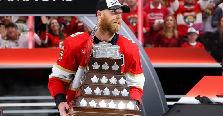 2025 Stanley Cup Final - Game Six SUNRISE, FLORIDA - JUNE 17: Sam Bennett #9 of the Florida Panthers celebrates with the Conn Smythe Trophy after defeating the Edmonton Oilers in Game Six of the 2025 Stanley Cup Final at Amerant Bank Arena on June 17, 2025 in Sunrise, Florida. (Photo by Bruce Bennett/Getty Images)