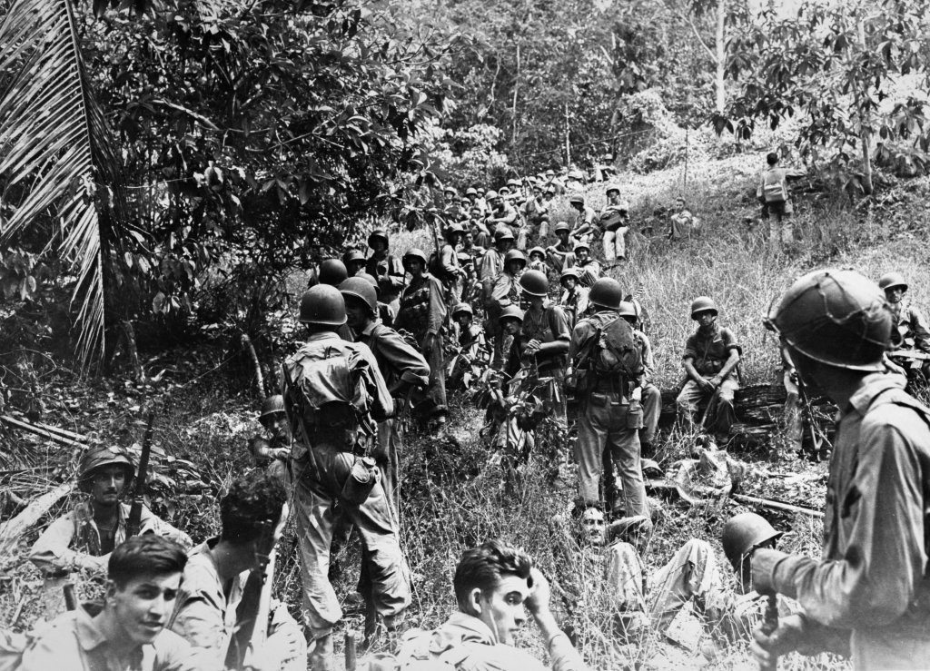 Marines rest during an advance on Guadalcanal. (U.S. Marine Corps)