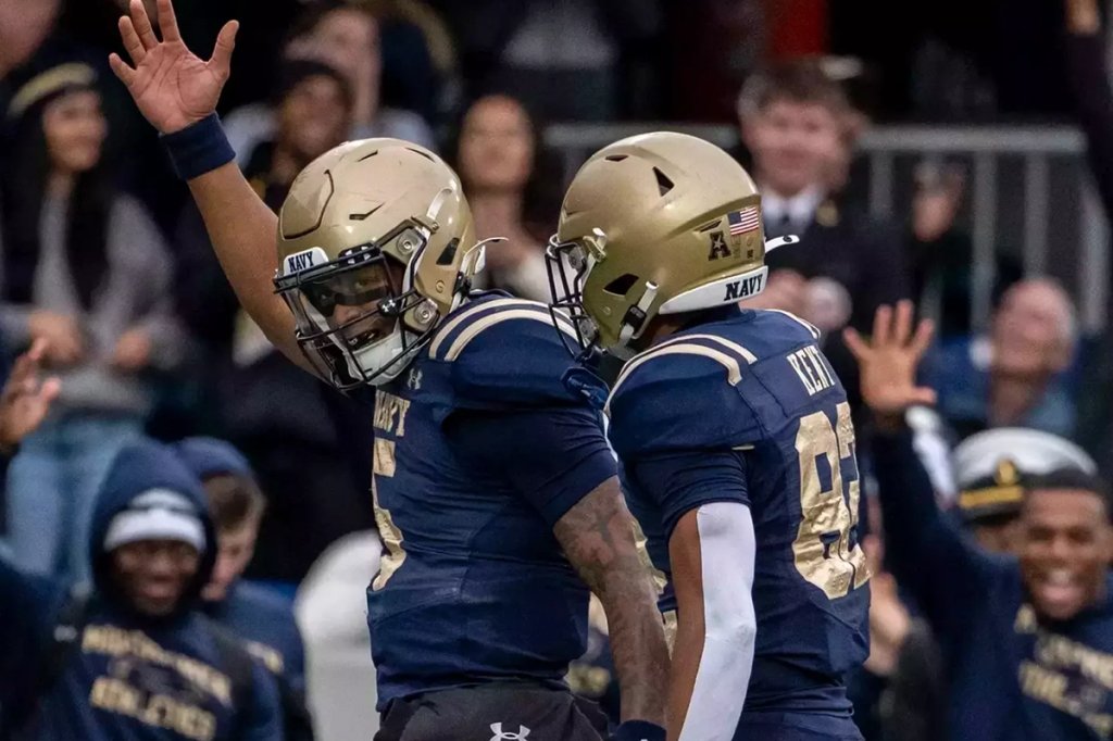 Navy backup quarterback Braxton Woodson led the Mids to a huge win. (Tommy Gilligan/Imagn Images)