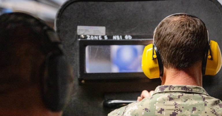 Naval Base San Diego Commanding Officer Capt. Robert A. Heely trains with a ballistic shield during a tactical training exercise. The training is designed to enhance law enforcements' ability to respond effectively to high-risk situations, ensuring readiness in operational environments. The ballistic shield provides added protection for personnel during potential threats, improving safety and mission success. (U.S. Navy photo by Aegis Fire Controlman 1st Class Bryce Cothran.)