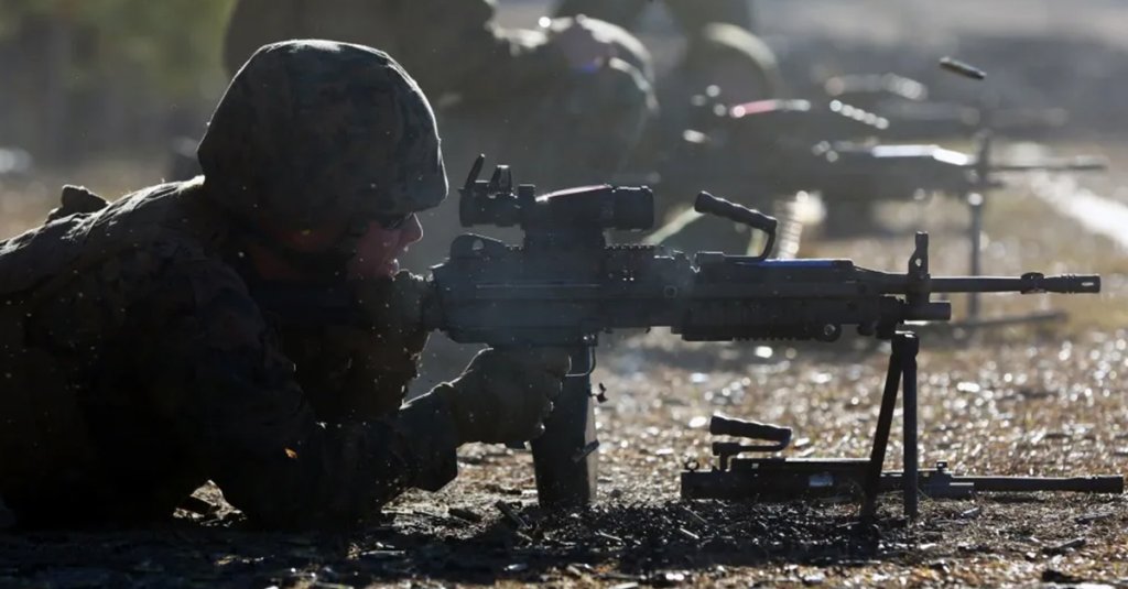 A Marine fires an M249 Squad Automatic Weapon during weapons systems training conducted by Marine Wing Support Squadron 271, Marine Aircraft Group 14, 2nd Marine Aircraft Wing aboard Marine Corps Base Camp Lejeune, N.C., Jan. 25, 2017. By keeping all Marines in the unit qualified on weapons systems, the Marines will be proficient and capable of providing ground security for any fixed-wing components of the aviation combat element. (U.S. Marine Corps photo by Cpl. Mackenzie Gibson/ Released)