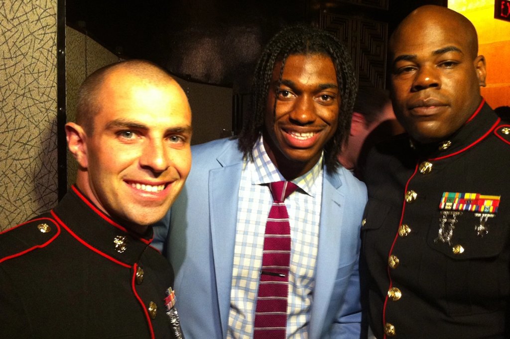 Sgt. Luke Boyd and Staff Sgt. Marlon Green with Robert Griffin III, drafted second overall at the 2012 NFL Draft. (U.S. Marine Corps/Gunnery Sgt. Matthew Butler