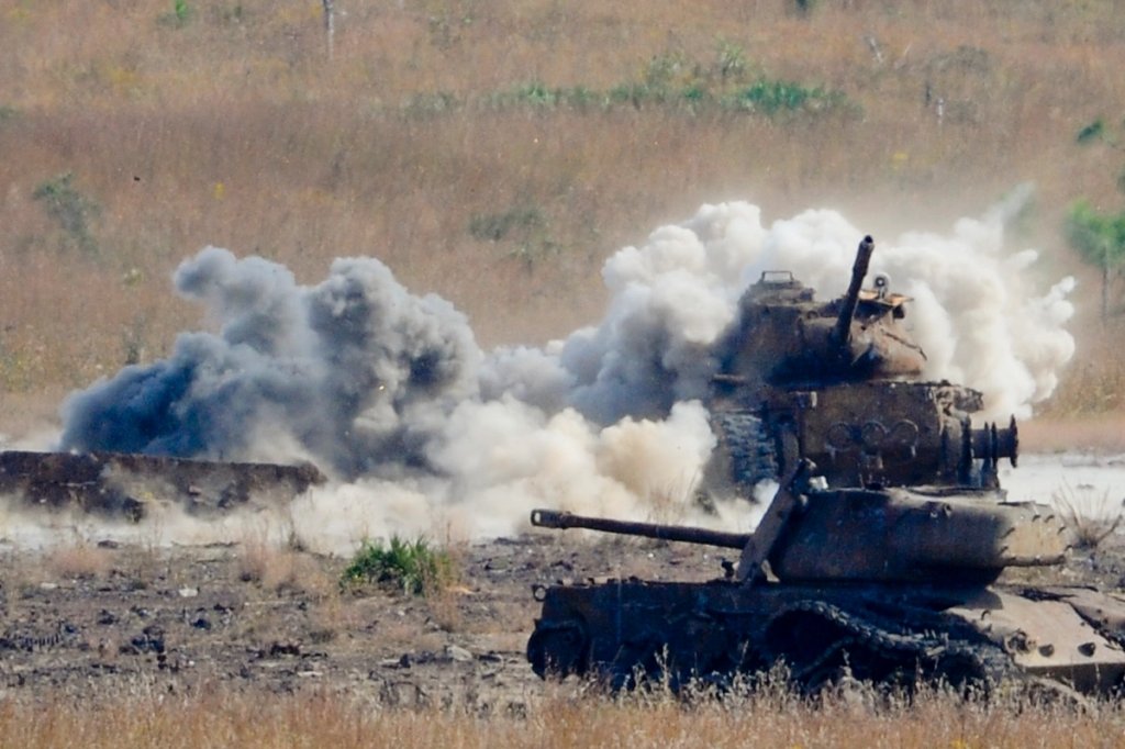 An AC- 130U Spooky Gunship 105mm round hits a target on Eglin Range, Eglin Air Force Base, Fla., Oct. 29, 2013. Army Special Forces members were trained on "Call for Fire" from an AC-130U. (U.S. Air Force Photo/Airman 1st Class Jeff Parkinson)