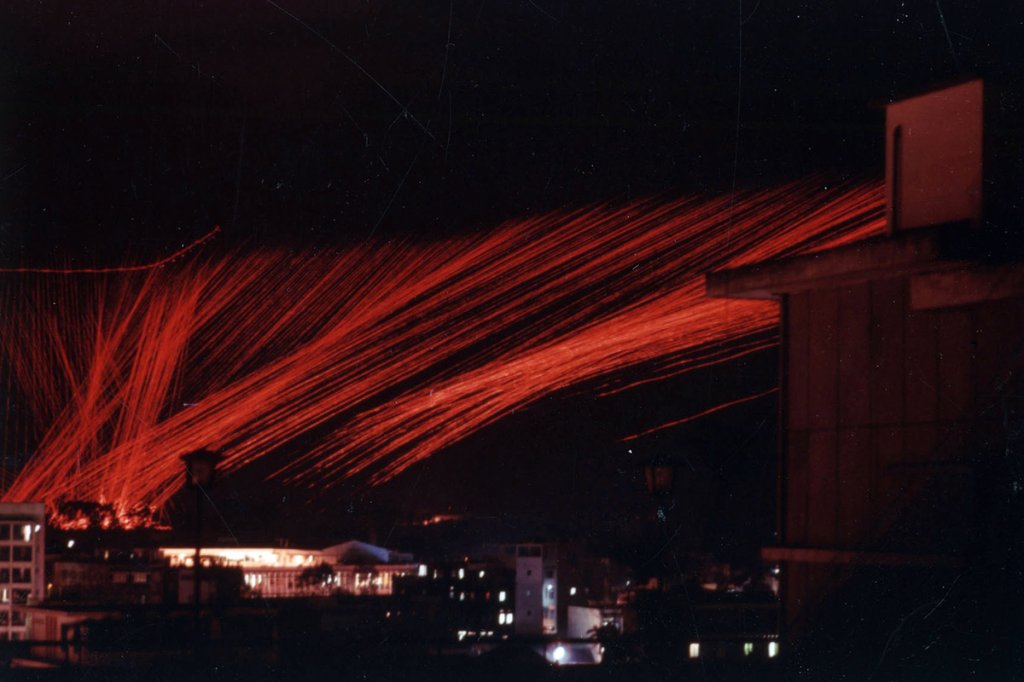 Night attack of a U.S. Air Force Douglas AC-47D Spooky gunship over Saigon in 1968. This time lapse photo shows the tracer round trajectories. (National Museum of the U.S. Air Force)