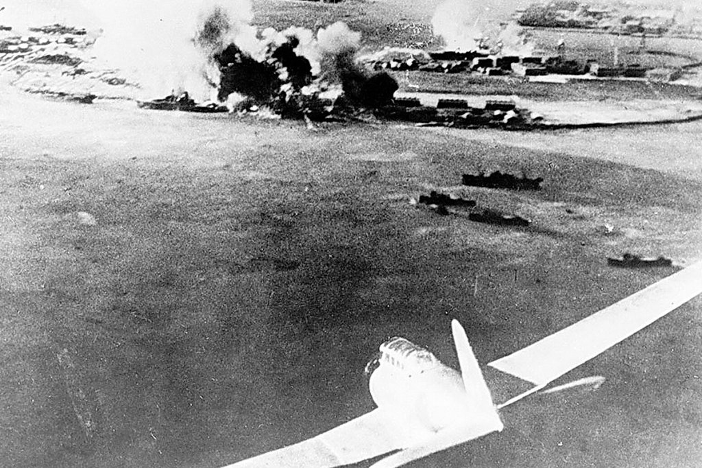 Japanese aircraft (presumably Aichi D3A) attacking Pearl Harbor.