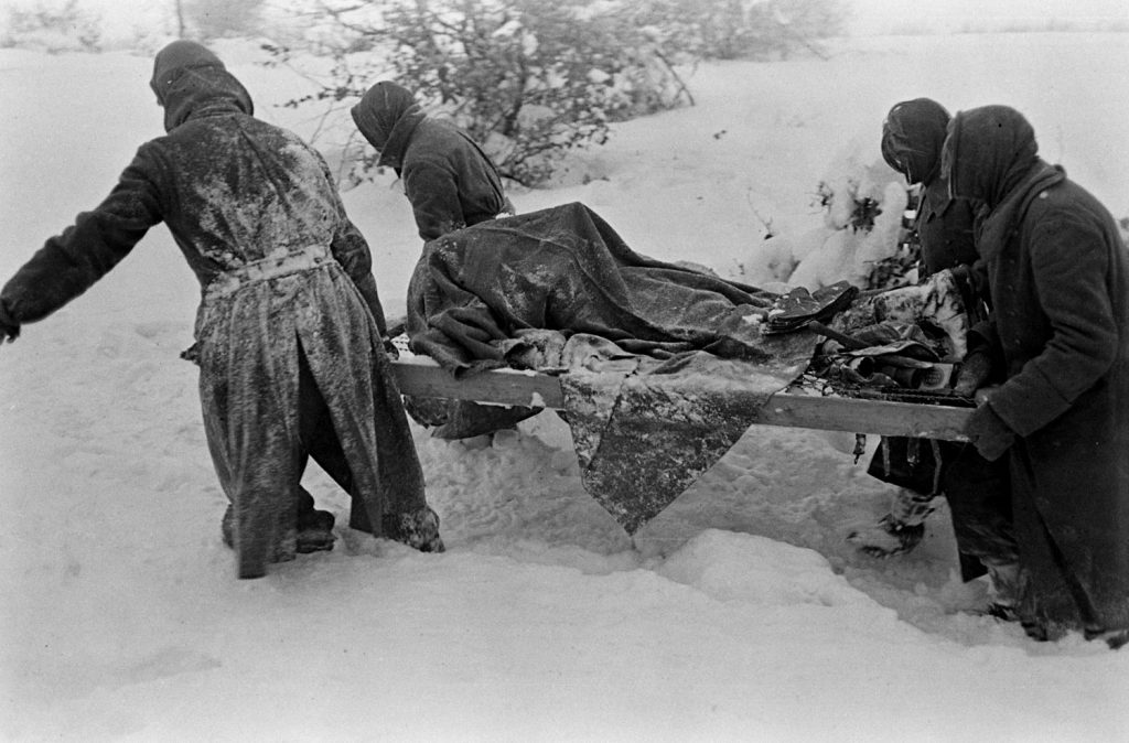 German POWs on grave-digging duty during the Battle of the Bulge. (George Silk/LIFE Picture Collection)