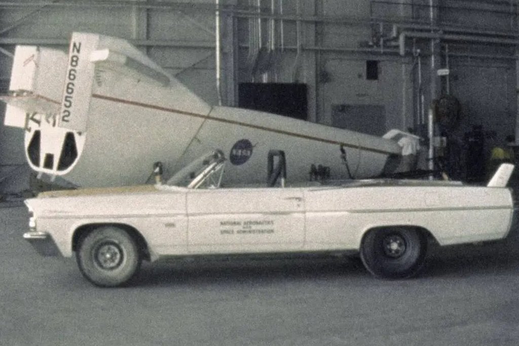 Pontiac Catalina Convertible Tow Vehicle with M2-F1 Lifting Body The M2-F1 Lifting Body is seen here in a hangar with its hot rod Pontiac convertible tow vehicle at the Flight Research Center, Edwards, CA. Nasa space shuttle future
