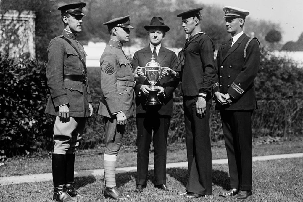 President Calvin Coolidge presents the President’s Cup at the White House. (National Archives)