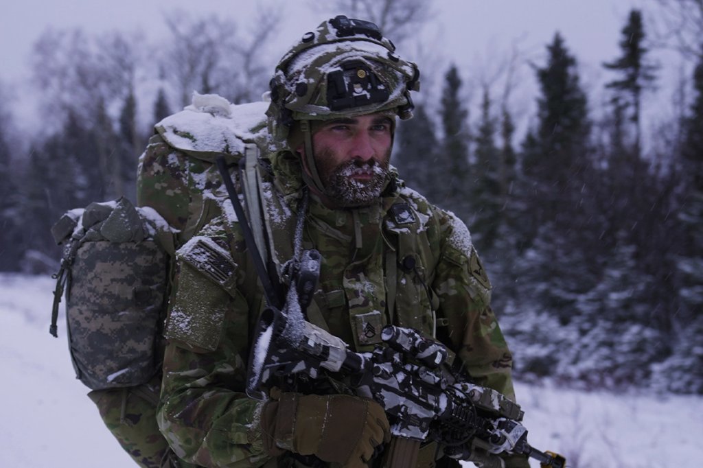 A U.S. Army Soldier moves towards his next objective during Joint Pacific Multinational Readiness Center 25-02 in Donnelly Training Area, near Fort Greely, Alaska, 