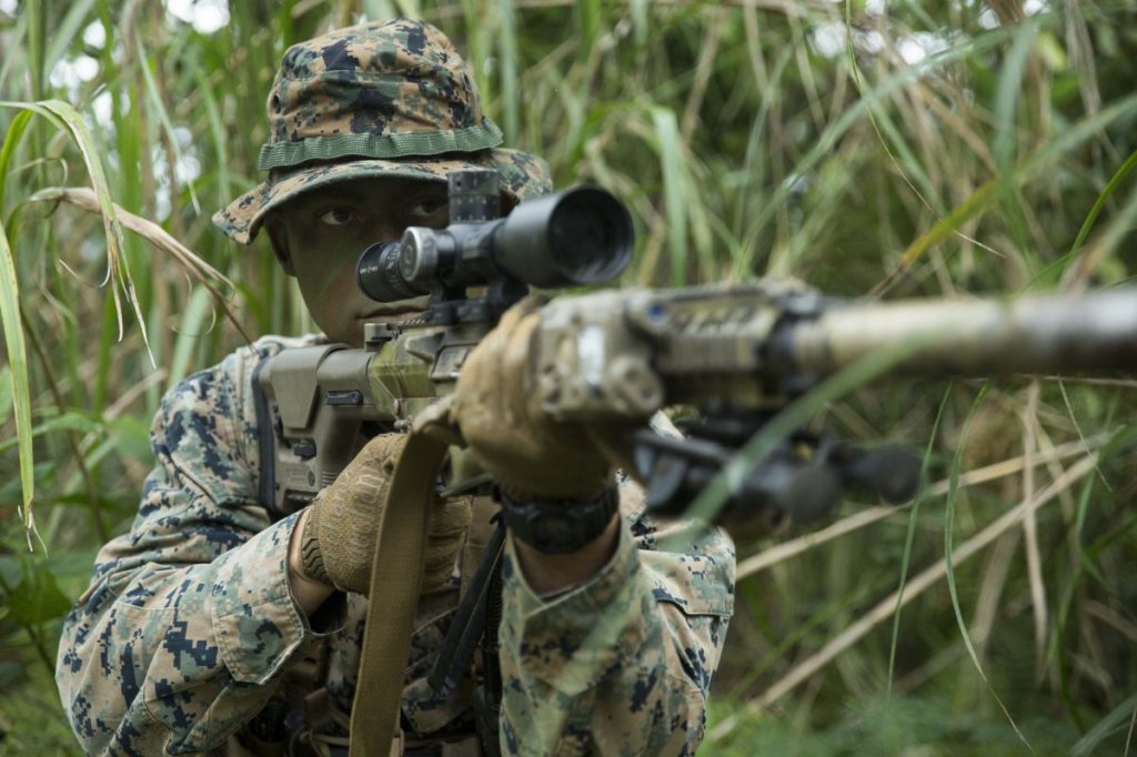 U.S. Marine Corps Cpl. Chancelor J. Kelso, a scout sniper team leader with Weapons Company, Battalion Landing Team 1/4, posts security during reconnaissance and surveillance training at Camp Hansen, Okinawa, Japan, Dec. 12, 2018. Scout Snipers provide all weather, day and night, continuous and systematic observation of the battlefield for intelligence purposes, which is vital to the success of the mission. BLT 1/4 is the Ground Combat Element for the 31st Marine Expeditionary Unit. Kelso, a native of Mandeville, Louisiana, graduated Mandeville High School in May 2015 before enlisting in January 2017. The 31st MEU, the Marine Corps’ only continuously forward-deployed MEU, provides a flexible and lethal force ready to perform a wide-range of military operations as the premier crisis response force in the Indo-Pacific region. (U.S. Marine Corps photo by Lance Cpl. Tanner D. Lambert)
